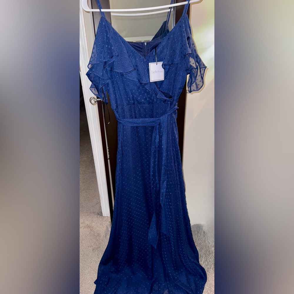 Women’s dress for wedding, formal occasion, or prom. Brand new with tags.